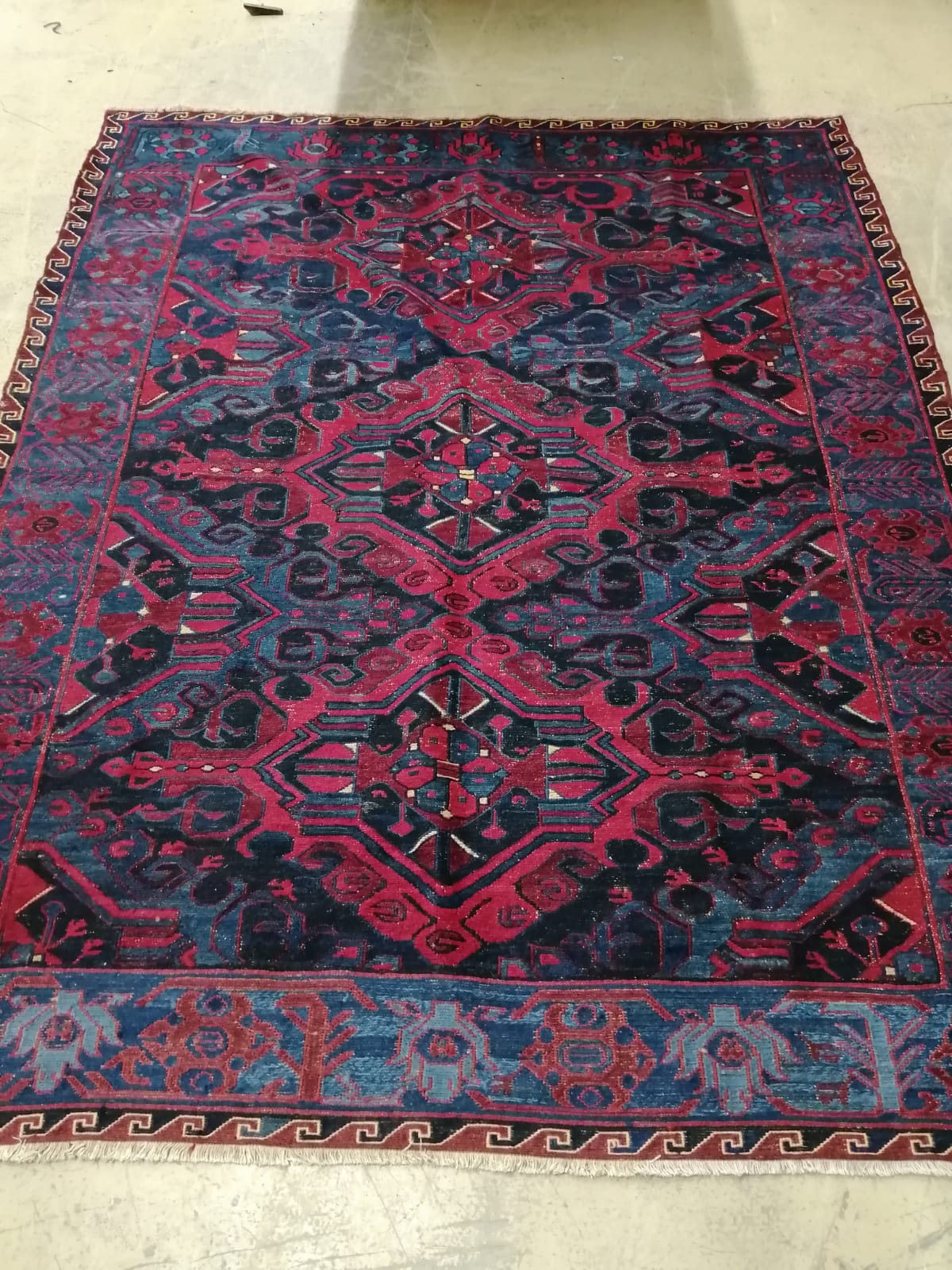 A Caucasian design blue ground Kelim rug, 213 x 170cm